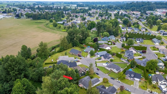 424 Wilson Ln, Sumas, WA 98295 - aerial view of property's location with nearby suburban area and a tree filled landscape