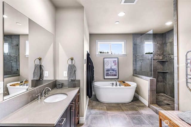 1301 Broad St, Bellingham, WA 98229 - bathroom with vanity, a freestanding tub, tiled shower, and recessed lighting