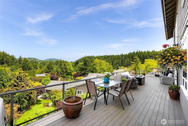 1301 Broad St, Bellingham, WA 98229 - deck with a wooded view, outdoor dining area, and outdoor lounge area