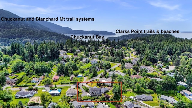 1301 Broad St, Bellingham, WA 98229 - aerial perspective of suburban area with property boundaries highlighted and mountains