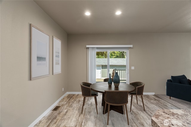 712 Syzygy Ct SE, Ocean Shores, WA 98569 - dining space with light wood finished floors and recessed lighting