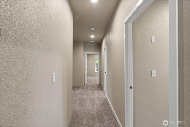 712 Syzygy Ct SE, Ocean Shores, WA 98569 - hall with carpet floors, recessed lighting, and a textured wall
