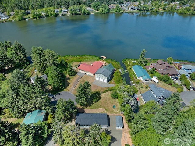 712 Syzygy Ct SE, Ocean Shores, WA 98569 - aerial overview of property's location with a large body of water and nearby suburban area