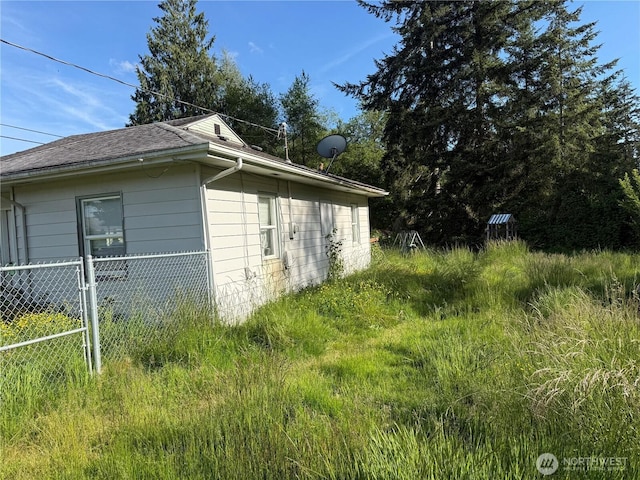 419 W Oak St, Mccleary, WA 98557 - view of side of property with a shingled roof
