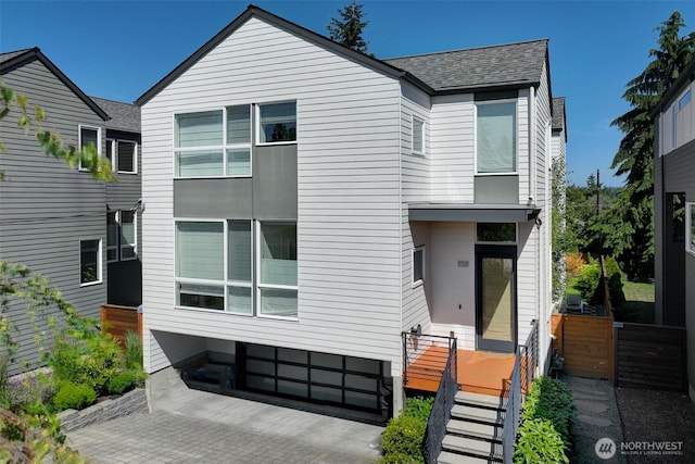9208 11th Ave NW, Seattle, WA 98117 - modern home featuring a shingled roof