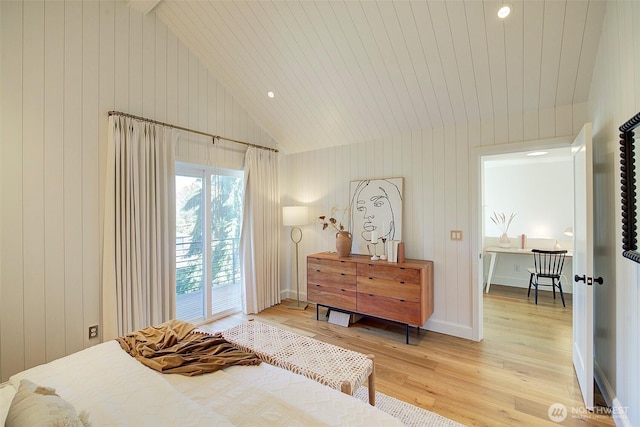 9208 11th Ave NW, Seattle, WA 98117 - bedroom featuring vaulted ceiling, light wood-type flooring, access to outside, and wooden walls