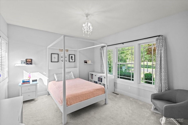 13228 202nd Ave SE, Issaquah, WA 98027 - bedroom featuring a chandelier and light colored carpet