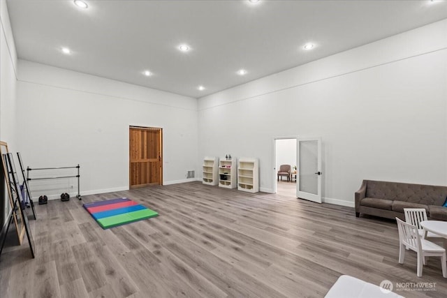 13228 202nd Ave SE, Issaquah, WA 98027 - workout area featuring wood finished floors and recessed lighting