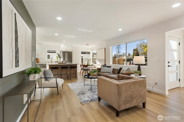 12852 Occidental Ave S, Seattle, WA 98168 - living room with light wood-type flooring and recessed lighting