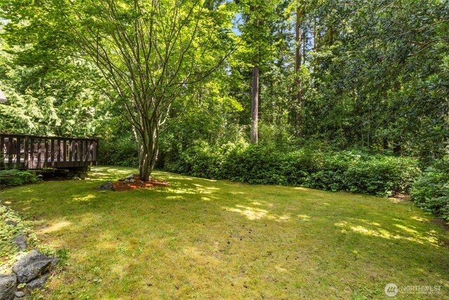 4766 Mason St, Port Townsend, WA 98368 - view of grassy yard with a deck