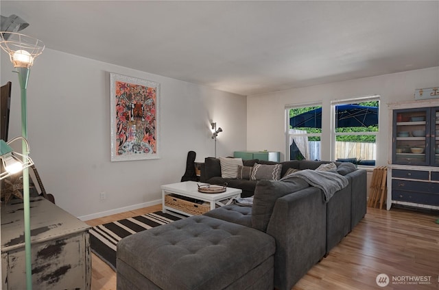 5850 Rest Pl NE, Bremerton, WA 98311 - living room featuring light wood-type flooring and baseboards