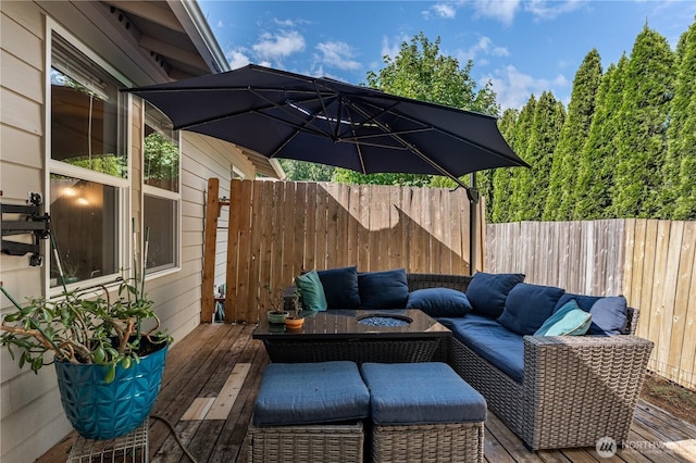 5850 Rest Pl NE, Bremerton, WA 98311 - wooden deck with an outdoor living space with a fire pit