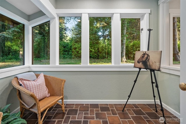 14855 Phelps Rd NE, Bainbridge Island, WA 98110 - sunroom / solarium with brick patterned floors and plenty of natural light