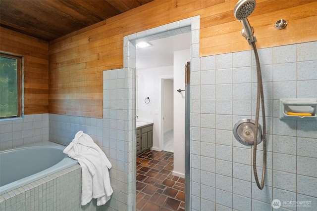 14855 Phelps Rd NE, Bainbridge Island, WA 98110 - bathroom featuring wooden ceiling, a relaxing tiled tub, vanity, a tile shower, and wood walls