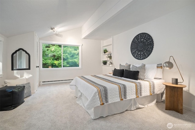 14855 Phelps Rd NE, Bainbridge Island, WA 98110 - carpeted bedroom featuring vaulted ceiling and a baseboard heating unit