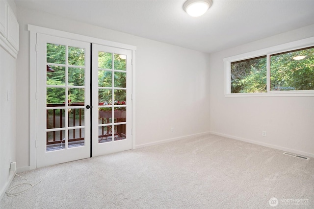 14855 Phelps Rd NE, Bainbridge Island, WA 98110 - carpeted spare room with healthy amount of natural light