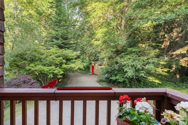 14855 Phelps Rd NE, Bainbridge Island, WA 98110 - view of yard featuring a wooded view and a balcony