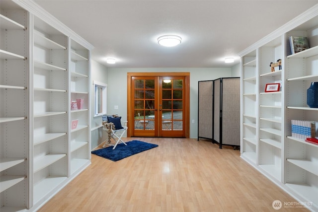 14855 Phelps Rd NE, Bainbridge Island, WA 98110 - living area featuring french doors and wood finished floors
