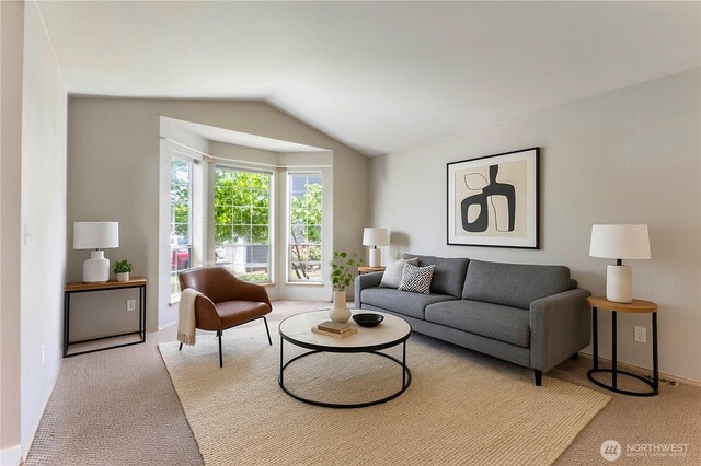 3035 Carbon Ridge St, Enumclaw, WA 98022 - carpeted living room with lofted ceiling and baseboards