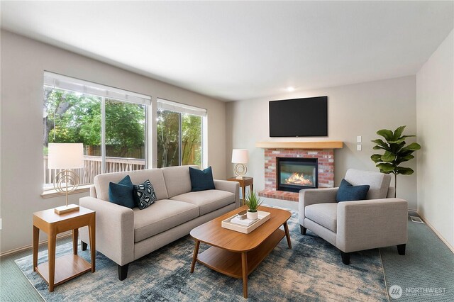 3035 Carbon Ridge St, Enumclaw, WA 98022 - living area featuring baseboards and a brick fireplace