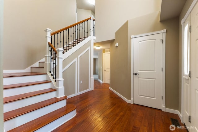 3035 Carbon Ridge St, Enumclaw, WA 98022 - foyer with hardwood / wood-style flooring, stairway, and a high ceiling