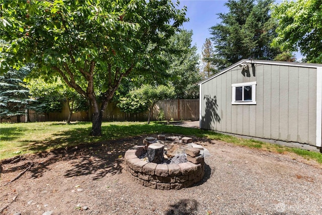3035 Carbon Ridge St, Enumclaw, WA 98022 - fenced backyard featuring an outdoor fire pit and a shed