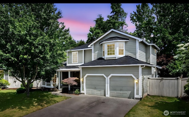 3035 Carbon Ridge St, Enumclaw, WA 98022 - traditional-style home with concrete driveway, a shingled roof, and an attached garage