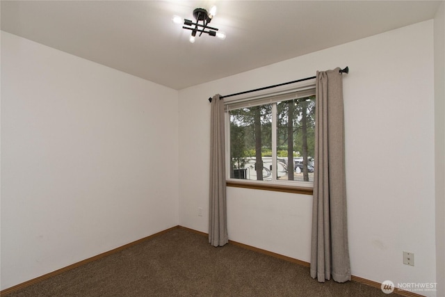408 Cross Creek Ct, South Prairie, WA 98385 - spare room with dark carpet and baseboards