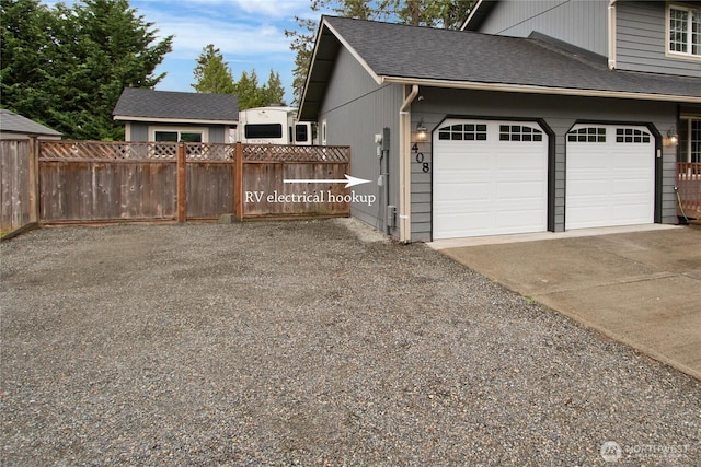 408 Cross Creek Ct, South Prairie, WA 98385 - view of property exterior featuring driveway, a garage, and a shingled roof