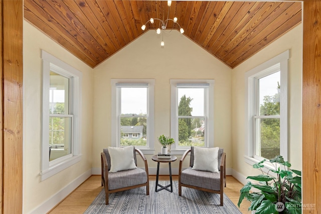 832 Willow St, Port Townsend, WA 98368 - living area featuring healthy amount of natural light, wood ceiling, light wood-style flooring, vaulted ceiling, and a chandelier