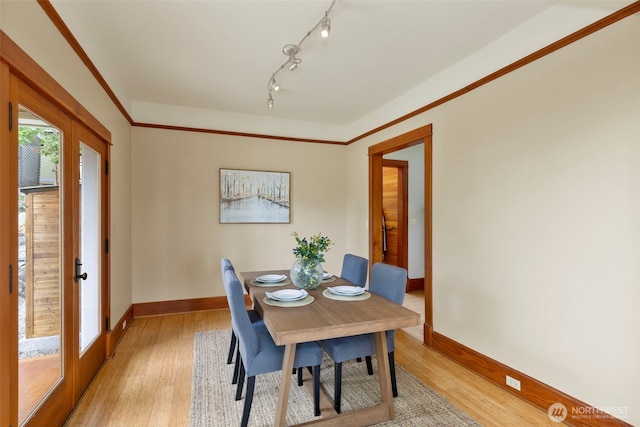 832 Willow St, Port Townsend, WA 98368 - dining room featuring light wood finished floors and baseboards