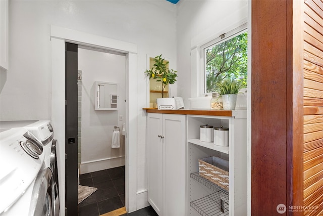 832 Willow St, Port Townsend, WA 98368 - bathroom featuring washing machine and dryer and tile patterned flooring