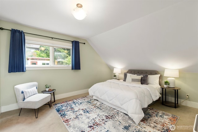 832 Willow St, Port Townsend, WA 98368 - carpeted bedroom featuring vaulted ceiling and baseboards