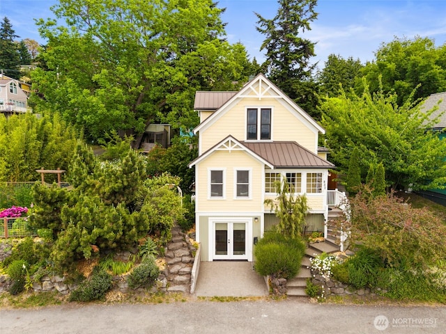 832 Willow St, Port Townsend, WA 98368 - view of front of house with french doors, a standing seam roof, and a metal roof