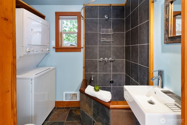 832 Willow St, Port Townsend, WA 98368 - full bath with stacked washing machine and dryer and a tile shower