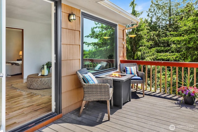 16071 Colony Rd, Bow, WA 98232 - wooden terrace with an outdoor fire pit