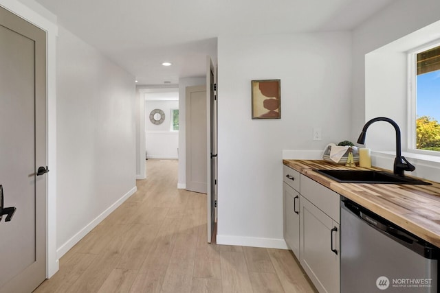 16071 Colony Rd, Bow, WA 98232 - bar area featuring dishwasher, light wood finished floors, and recessed lighting