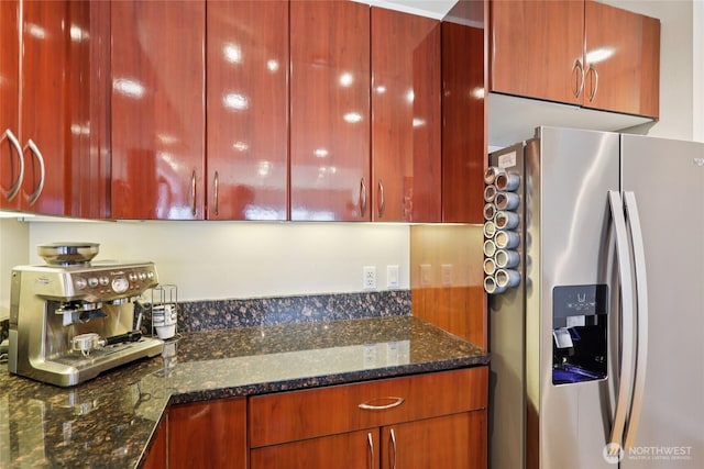 1 Broadway Unit 721, Tacoma, WA 98402 - kitchen with stainless steel fridge with ice dispenser, dark stone counters, dark brown cabinets, and modern cabinets