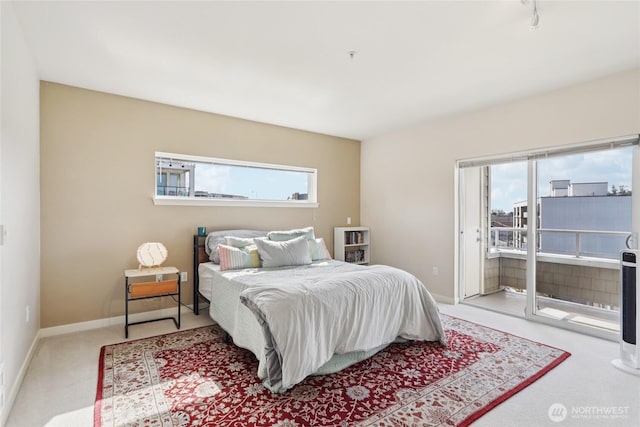 1 Broadway Unit 721, Tacoma, WA 98402 - bedroom featuring access to exterior and carpet floors