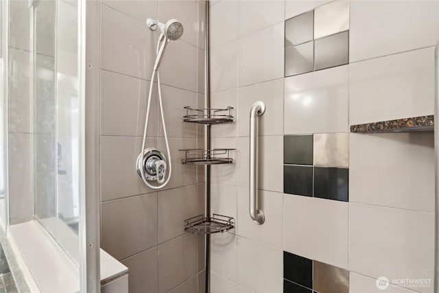 1 Broadway Unit 721, Tacoma, WA 98402 - bathroom featuring tiled shower