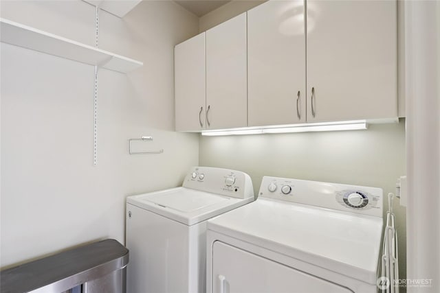1 Broadway Unit 721, Tacoma, WA 98402 - laundry room with cabinet space and washer and clothes dryer