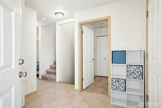 6205 26th St NE, Tacoma, WA 98422 - corridor with stairs and light tile patterned floors
