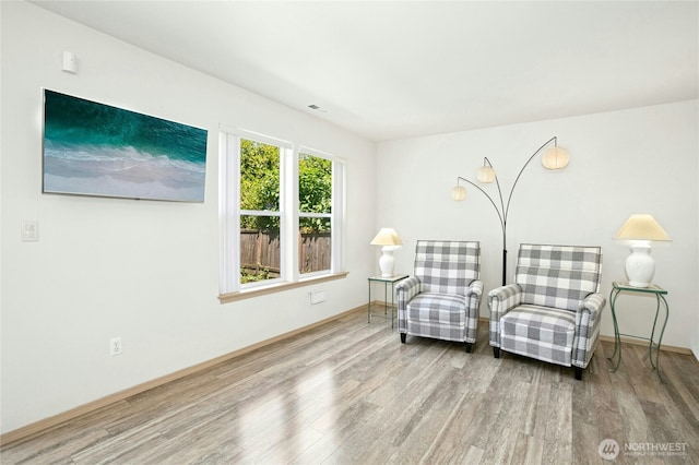 6205 26th St NE, Tacoma, WA 98422 - sitting room with wood finished floors and baseboards