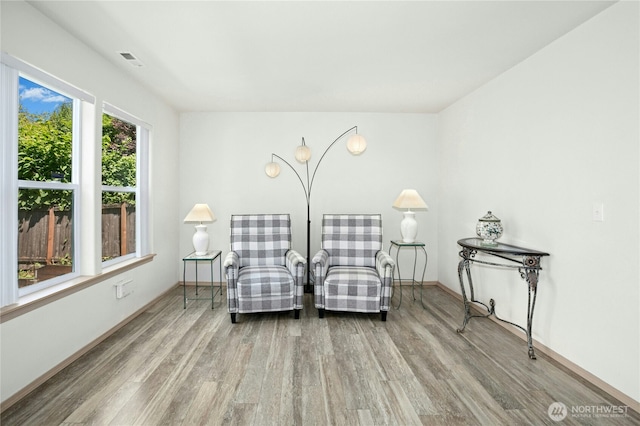 6205 26th St NE, Tacoma, WA 98422 - sitting room with wood finished floors and baseboards