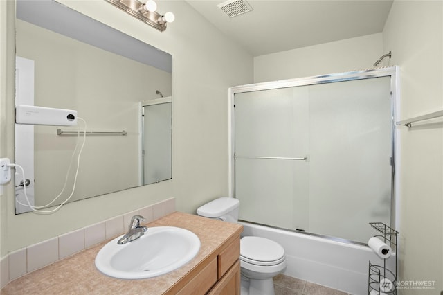 6205 26th St NE, Tacoma, WA 98422 - bathroom with vanity, bath / shower combo with glass door, and tile patterned floors