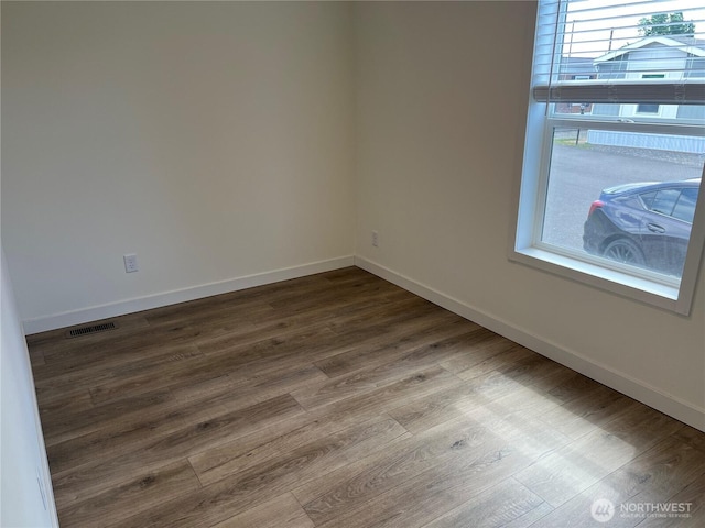 5711 112th Avenue Ct E Unit 30, Puyallup, WA 98372 - unfurnished room featuring baseboards and wood finished floors