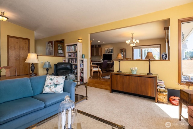 1807 Bradley Dr, Anacortes, WA 98221 - carpeted living room featuring a desk and a chandelier