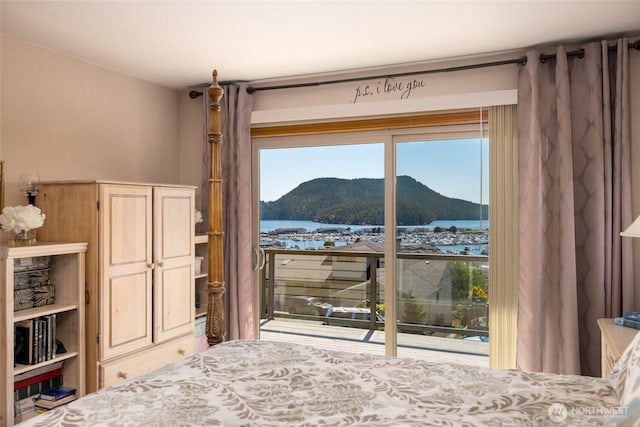 1807 Bradley Dr, Anacortes, WA 98221 - bedroom featuring access to exterior and a water and mountain view