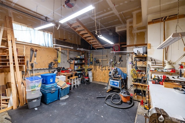 1807 Bradley Dr, Anacortes, WA 98221 - garage featuring a workshop area and a garage door opener