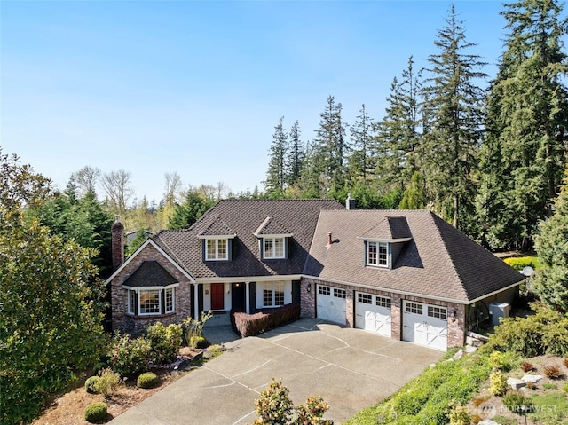 413 213th Pl SE, Sammamish, WA 98074 - view of front of house featuring covered porch, a chimney, concrete driveway, and a garage